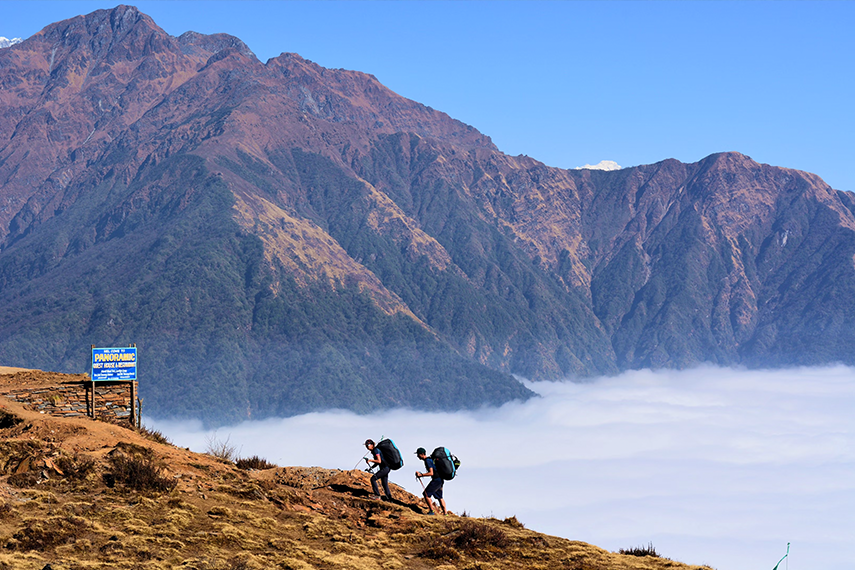 Elevate Trek- Two people hiking on the trail to Mardi Himal Trek