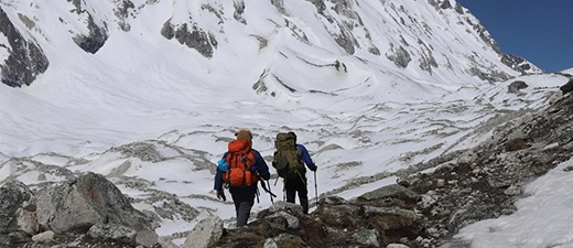 Elevate Trek-Two trekkers with backpacks embark on a trekking adventure in the Annapurna region.