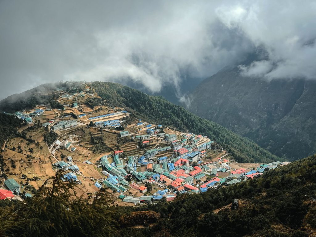 A stunning aerial view of Namche Bazaar nestled in the Himalayan mountains of Nepal.