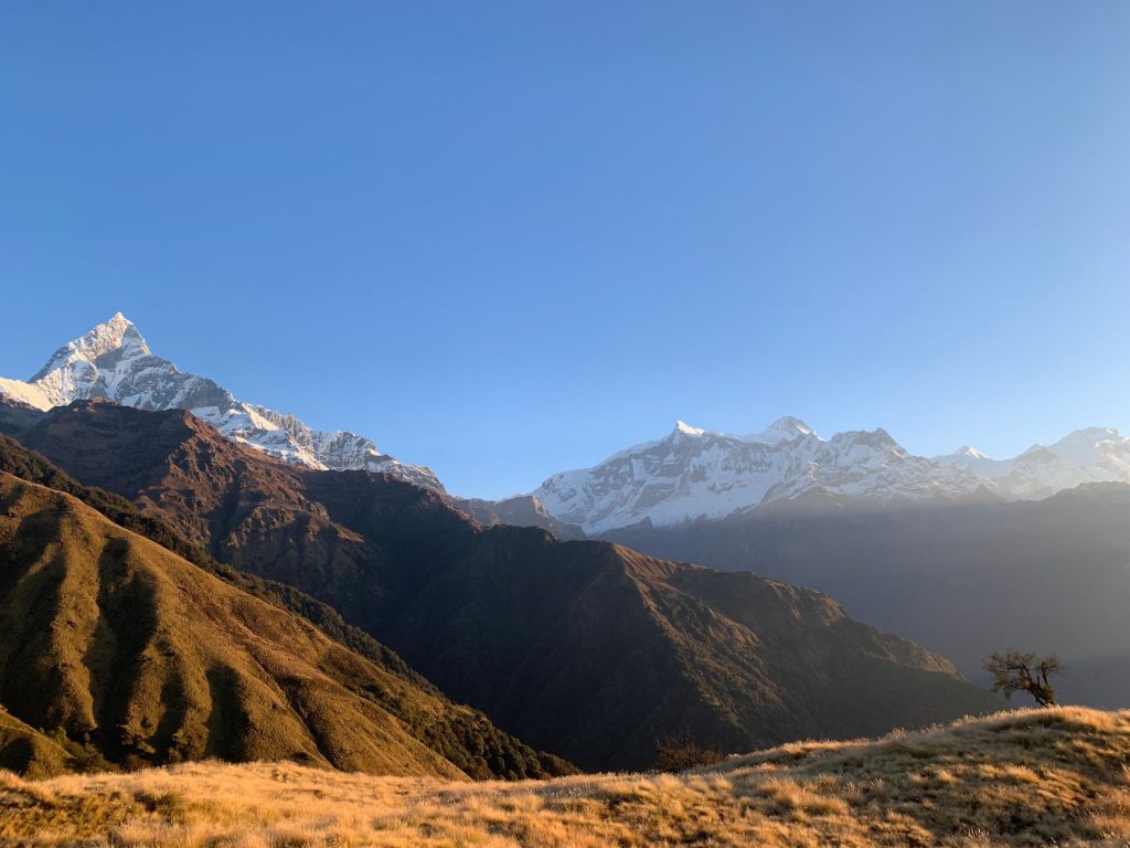 Explore the majestic Machapuchare Peak in the Annapurna range, captured at sunrise in Gandaki Province, Nepal.